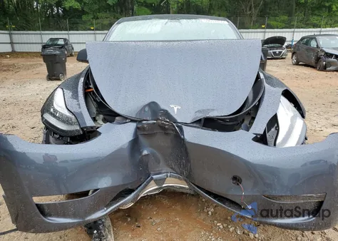 2023 Tesla Model Y from USA, damaged, VIN 7SAYGDEE6PA038113